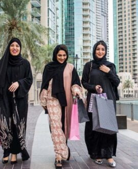 Women in Dubai with Shopping Bags | Dintravel® Women in Dubai with Shopping Bags