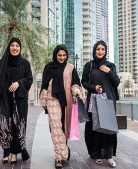 Women in Dubai with Shopping Bags | Dintravel® Women in Dubai with Shopping Bags